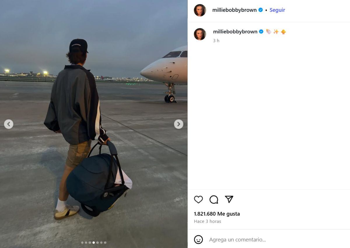 La actriz publicó una foto de su esposo sosteniendo el portabebés en la pista de un aeropuerto, acompañada por emoticonos de biberón y estrella (Instagram/@milliebobbybrown)
