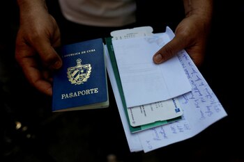 Frank Eduardo holds a passport