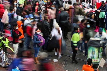 People walk through the commercial