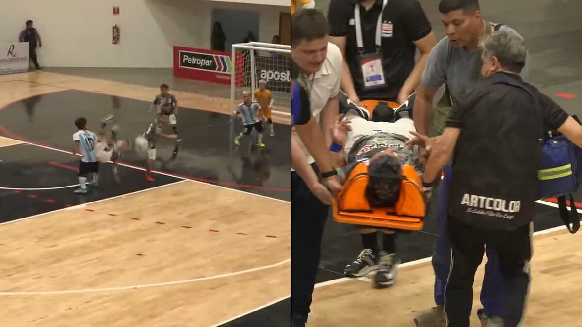 Jugador retirado en camilla durante la final Argentina-Paraguay en Asunción