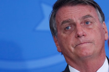 Brazil's President Jair Bolsonaro looks