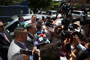 Lawyers of the Salvadoran Football Federation talk to the media after meeting at the Attorney General?s office to hear about an investigation for alleged fraudulent administration and money laundering, in San Salvador, El Salvador July 18, 2022. REUTERS/Jose Cabezas