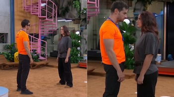 Dos tomas de un hombre con camiseta naranja y una mujer con camiseta gris parados frente a frente en un espacio con una escalera rosa.