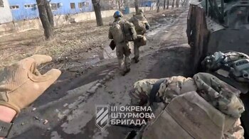 Ukrainian soldiers get out of