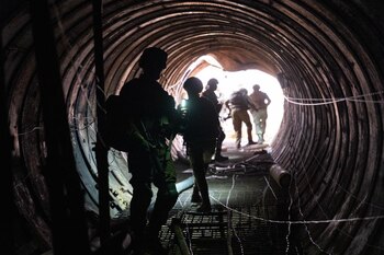 GAZA, Dec. 18, 2023 -- This photo released by the Israel Defense Forces (IDF) on Dec. 17, 2023 shows Israeli soldiers examining a large underground Hamas tunnel system uncovered in the Gaza Strip. The IDF said it has uncovered the largest underground Hamas tunnel system in Gaza so far. The system splits into branches of tunnels, spans over more than 4 km and reaches 400 meters from the Erez crossing, a passageway between Gaza and Israel.,Image: 830442615, License: Rights-managed, Restrictions: , Model Release: no, Credit line: Xinhua / Xinhua News / ContactoPhoto