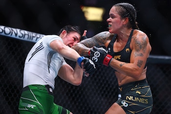 Jun 10, 2023; Vancouver, BC, Canada; Amanda Nunes lands a hit against Irene Aldana during UFC 289 at Rogers Arena. Mandatory Credit: Sergei Belski-USA TODAY Sports