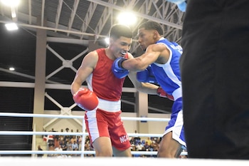 Miguel Ángel Encarnación avanzó automáticamente a la siguiente ronda del boxeo de Santo Domingo 2026 después de la descalificación del nicaragüense Andy Javier Caballero. (Cortesía: Federación Dominicana de Boxeo)