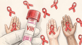 Mano enguantada sostiene tubo de ensayo con etiqueta VIH. Nueve lazos rojos y cuatro manos abiertas con distintos tonos de piel en la ilustración.