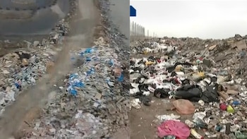 Vista aérea de un camino de tierra flanqueado por desperdicios y toma a nivel del suelo de grandes acumulaciones de plástico y escombros