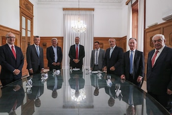 Los delegados de la Reunión