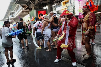 Revellers from Vietnam and Philippines