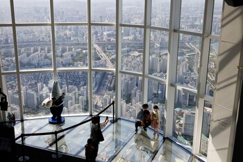 A family wearing masks to