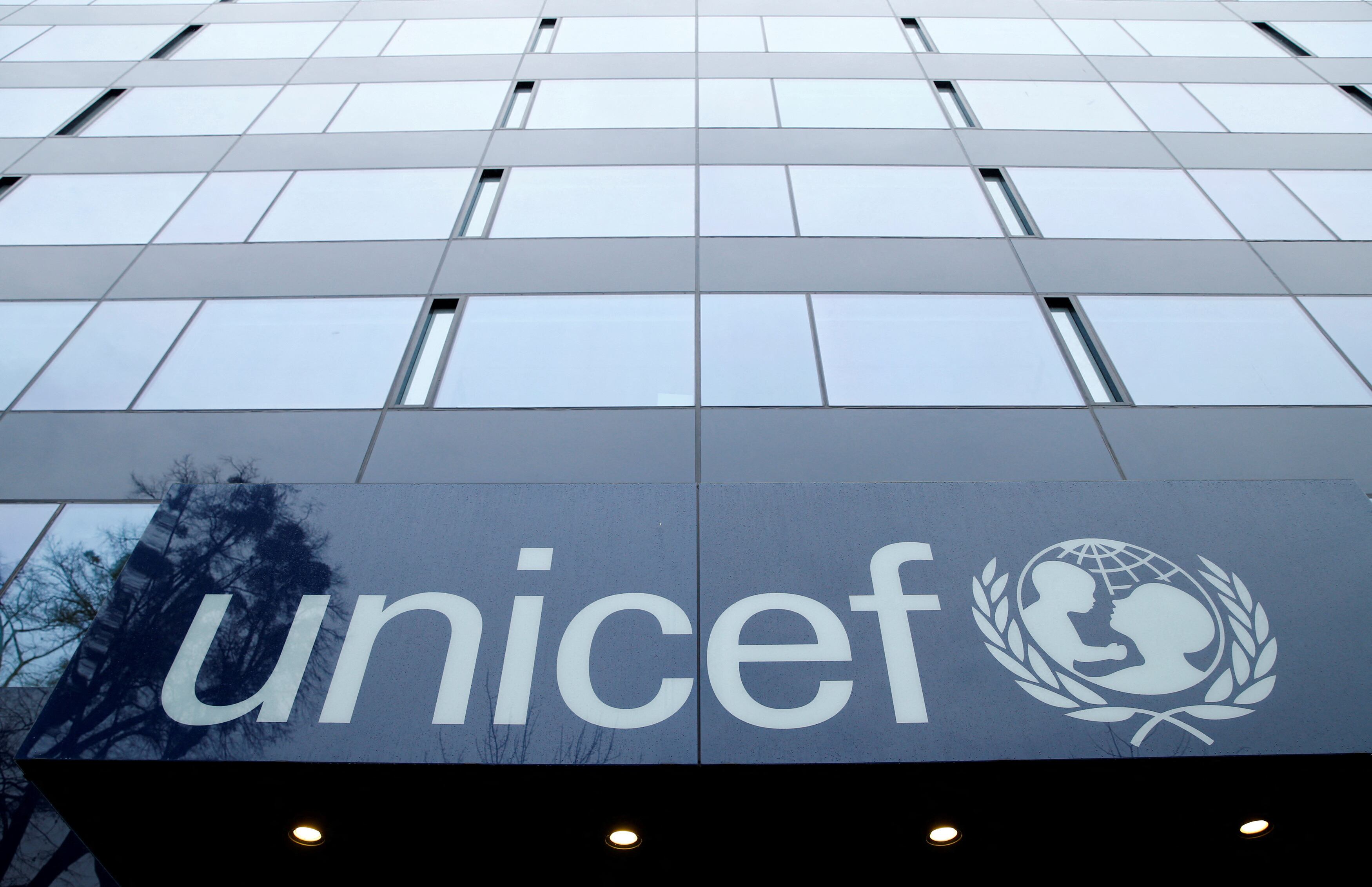 FILE PHOTO: A UNICEF logo is pictured outside their offices in Geneva, Switzerland, January 30, 2017. REUTERS/Denis Balibouse/File Photo