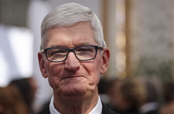Apple CEO Tim Cook poses