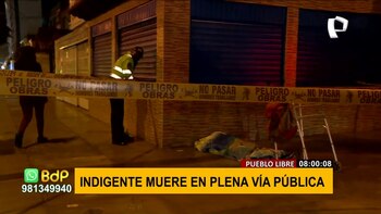 Mujer indigente y patrullero policial