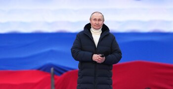 Russian President Vladimir Putin attends