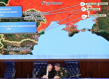 Putin junto al jefe del