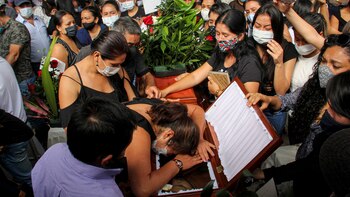 Friends and relatives mourn next