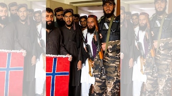 Talibanes con la bandera de Noruega (foto: Afterposten)