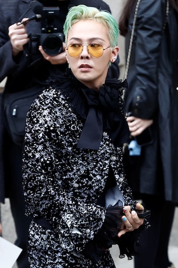 G-Dragon arrives to attend the Chanel Haute Couture Spring/Summer 2025 collection show in Paris, France, January 28, 2025. REUTERS/Abdul Saboor
