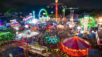 Sívarland 2026 se instalará en los alrededores del Estadio Cuscatlán del 1 al 6 de agosto en el marco de las Fiestas Agostinas (Cortesía: @PrimeraLineaSLV).