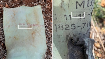 Left: One of two remnants of white phosphorous smoke rounds found in Dheira. Their lot production codes begin with “PB-92,” which denotes production in Pine Bluff, Ark., in 1992. Right: A third remnant found in Dheira is printed with “THS-89,” which denotes production in 1989 by Thiokol Aerospace at a Louisiana plant. (William Christou for The Washington Post)