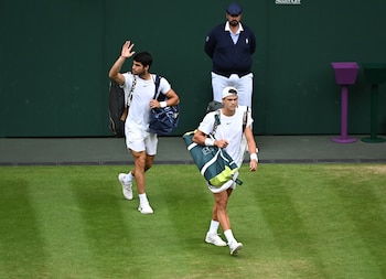 Alcaraz y Rune en Wimbledon (REUTERS/Dylan Martinez)