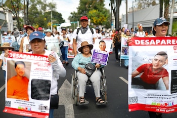Madres y familiares de personas desaparecidas marchan en demanda de justicia en el marco del Día de la Madre, este domingo en la ciudad de Guadalajara en Jalisco (México). EFE/Francisco Guasco