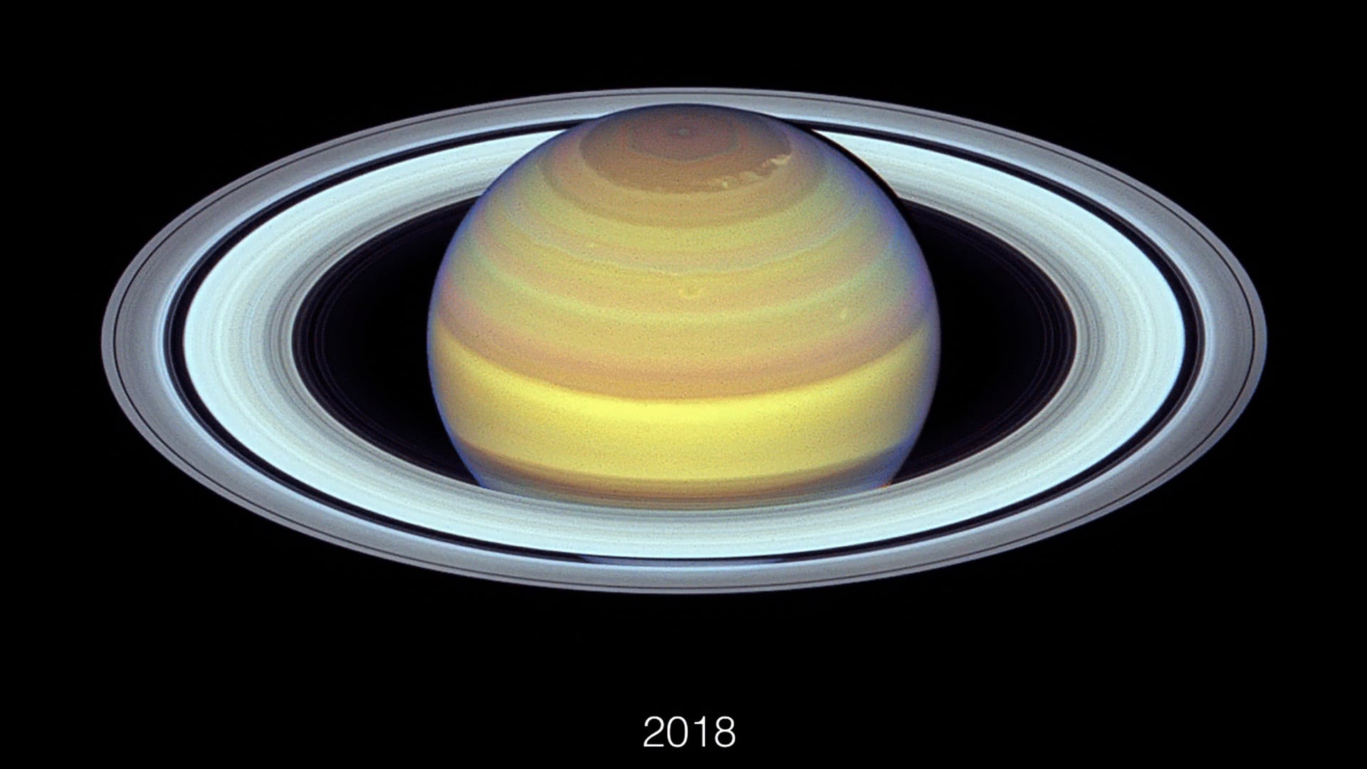 Las simulaciones indican que la gravedad de Saturno separó el manto helado de Crisálida, dejando el núcleo rocoso en la atmósfera o el interior planetario (Crédito: NASA, ESA, Amy Simon (NASA-GSFC), Michael H. Wong (University of California), Joseph DePasquale (STScI))