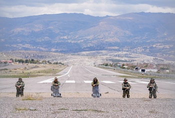 Police stand guard at the