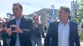 La imagen de Pellegrini junto