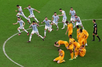 Soccer Football - FIFA World Cup Qatar 2022 - Quarter Final - Netherlands v Argentina - Lusail Stadium, Lusail, Qatar - December 10, 2022 Argentina and Netherlands players react after the penalty shootout as Argentina progress to the semi finals and Netherlands are eliminated from the World Cup REUTERS/Paul Childs TPX IMAGES OF THE DAY