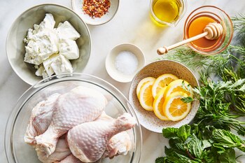 Ingredients for chile-roasted chicken with honey, lemon and feta, in New York, April 28, 2021. Serve this chile-roasted chicken with a loaf of crusty bread or flatbread for scooping up all the tangy pan juices. Food styled by Judy Kim. (Linda Xiao/The New York Times)