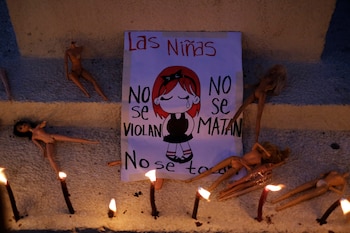 Dolls are seen during a