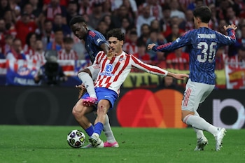 El partido de Champions entre el Atlético de Madrid y el Arsenal (EFE/Kiko Huesca)