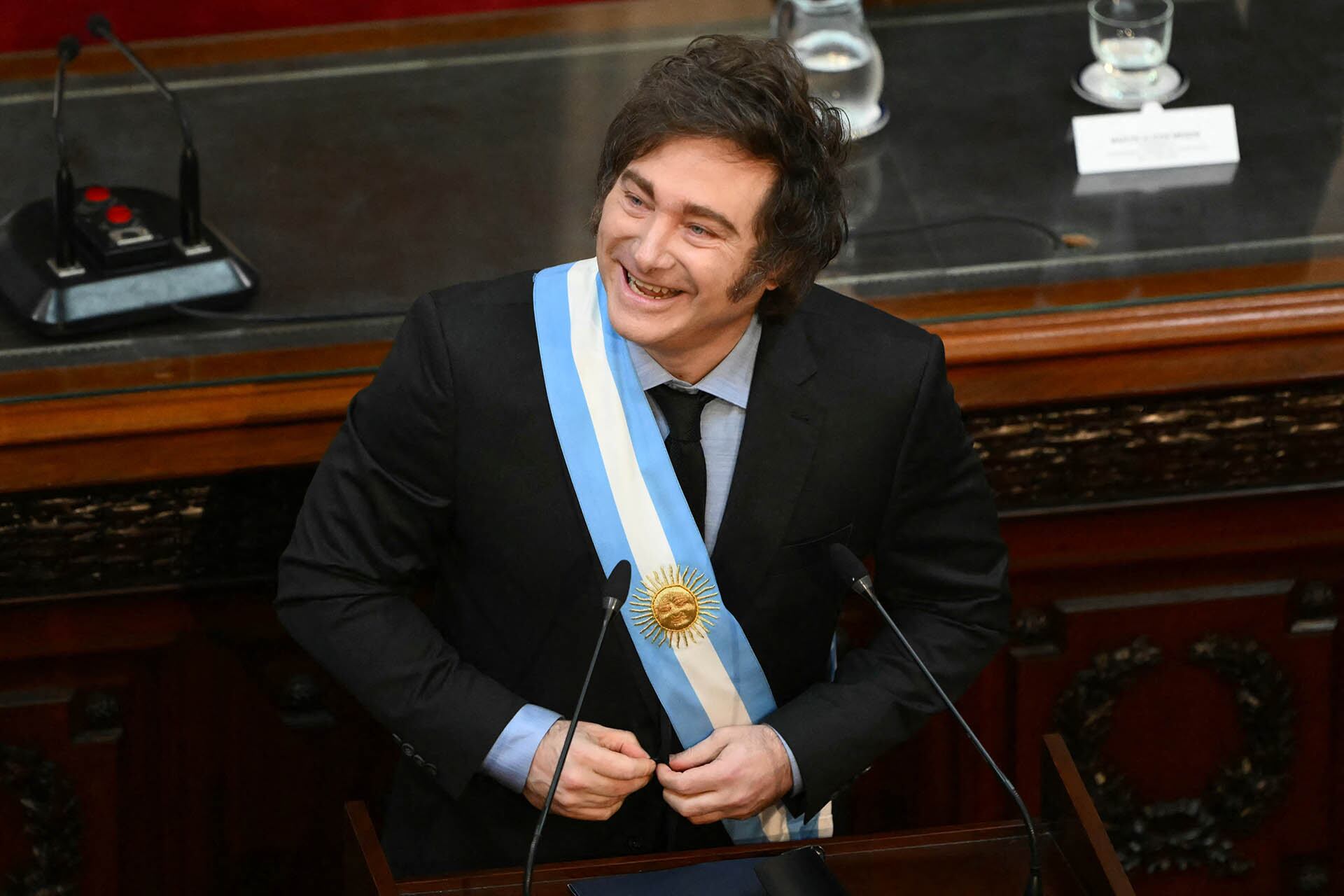 Argentina's President Javier Milei gestures during the inauguration of the 143rd ordinary session of Congress at the National Congress in Buenos Aires on March 1, 2025. (Photo by Luis ROBAYO / AFP)