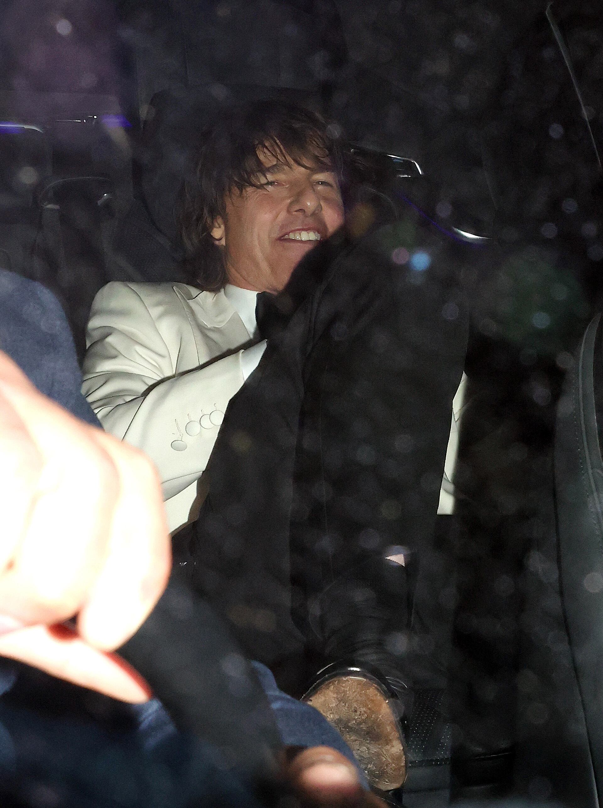 Tom Cruise y Ana De Armas intentaron ocultarse de la prensa tras salir juntos del cumpleaños de David Beckham. (Goff Photos/The Grosby Group)