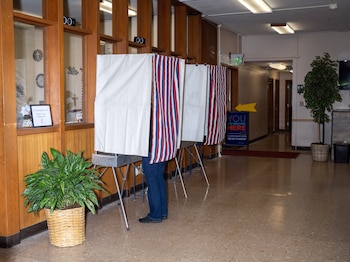 A primary voter casts his ballot in Anchorage, Alaska., on Tuesday, Aug. 18, 2026. Incumbent Sen. Dan Sullivan (R-Alaska), and former Rep. Mary Peltola, a Democrat, easily advanced to the general election ballot on Tuesday in AlaskaÕs Senate primary, setting up a highly anticipated matchup that could decide control of the Senate. (Ash Adams/The New York Times)