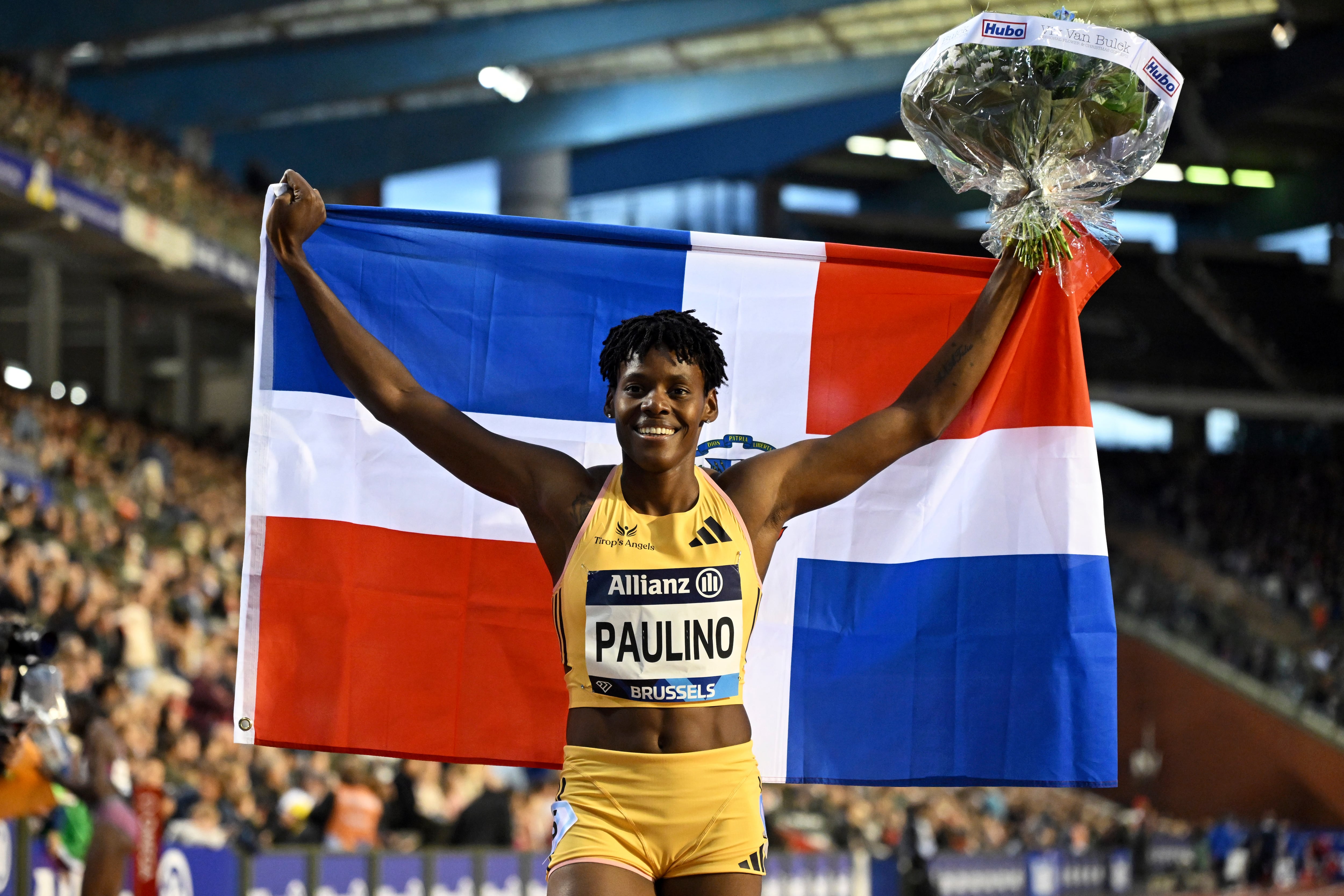 La dominicana Marileidy Paulino tras ganar los 400 metros femeninos durante la última justa de la Liga Diamante, el viernes 13 de septiembre de 2024, en Bruselas. (AP Foto/Frederic Sierakowski)