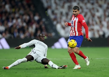 Soccer Football - LaLiga - Real Madrid v Atletico Madrid - Santiago Bernabeu, Madrid, Spain - February 4, 2024 Real Madrid's Ferland Mendy in action with Atletico Madrid's Angel Correa REUTERS/Isabel Infantes