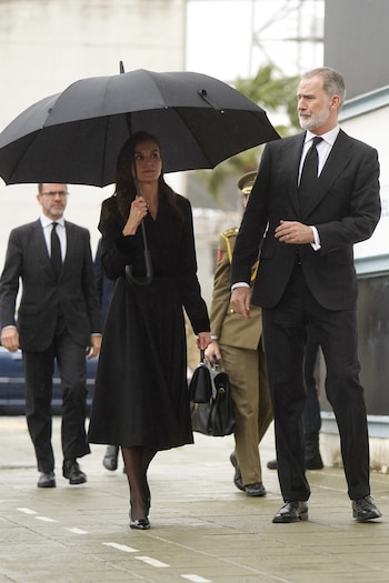 Los reyes de España asisten