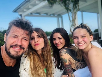 Marcelo Tinelli con sus hijas