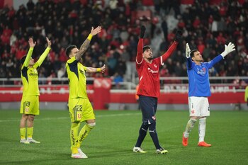 Lomónaco y varios jugadores de