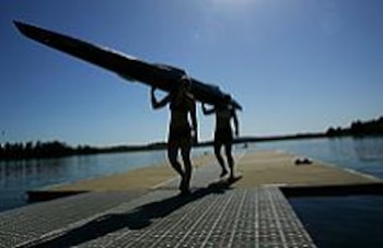 SYDNEY, AUSTRALIA - JANUARY 15: Flatwater canoe competitors exit the water during day two of the Australian Youth Olympic Festival at the Sydney International Regatta Centre on January 15, 2009 in Sydney, Australia. (Photo by Matt King/Getty Images)