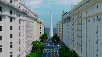 Perspectiva de una avenida con edificios laterales, árboles y un obelisco central al fondo, construidos con bloques pixelados