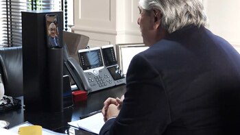 Los presidentes, durante su comunicación