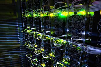 Illuminated application-specific integrated circuit (ASIC)