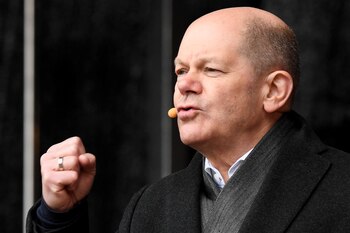 German Chancellor Olaf Scholz gestures