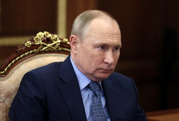 Russian President Vladimir Putin attends