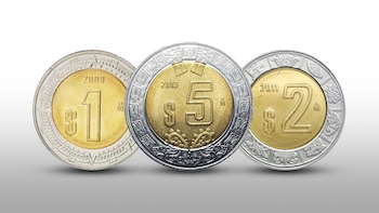 Tres monedas de pesos de